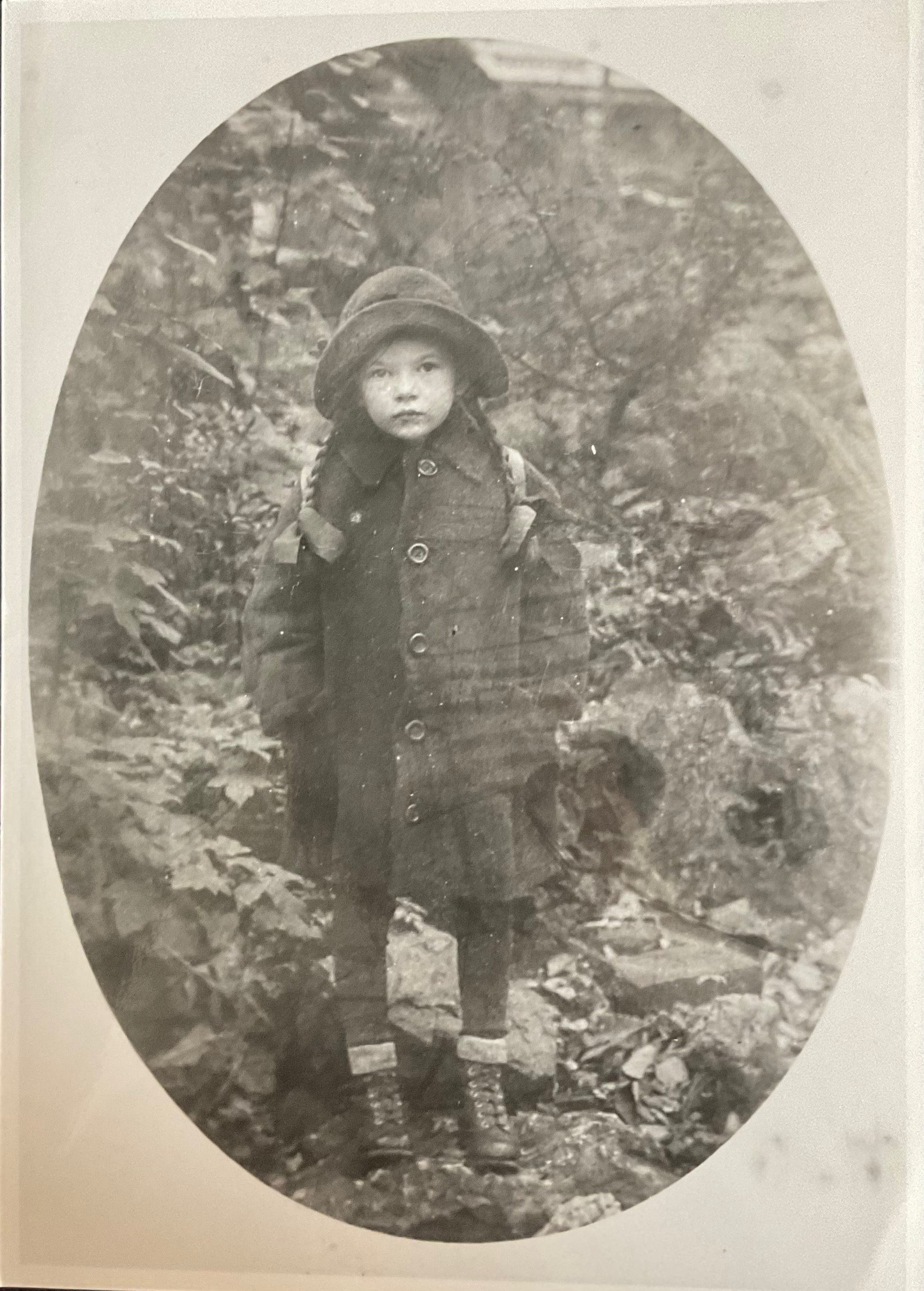 Edith Kramer as a child standing outdoors